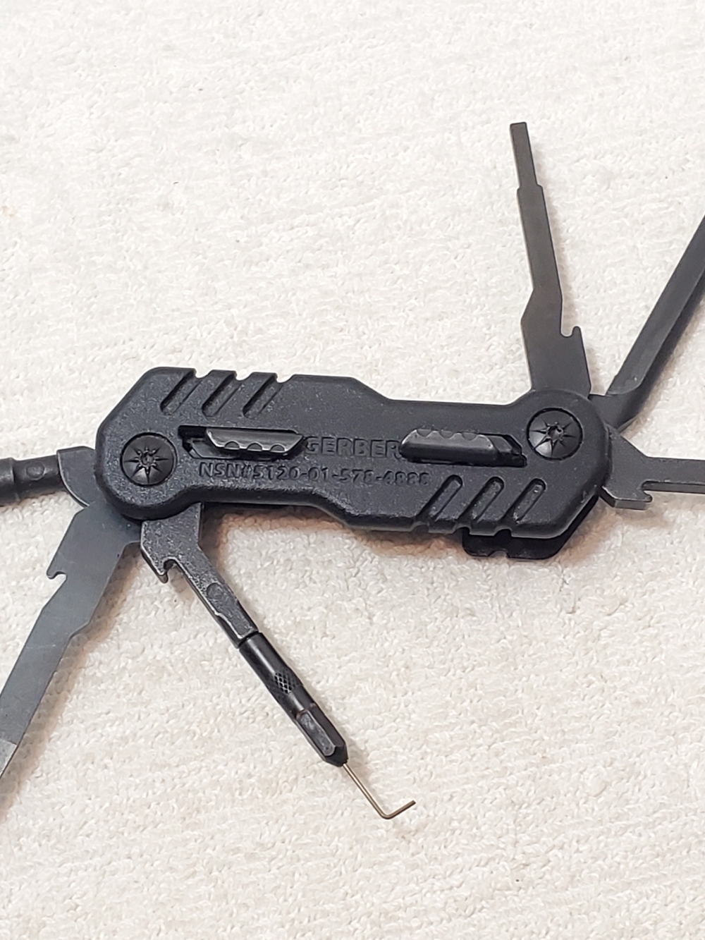 Gerber Black Multitool Short Reach Extraction Cleaning Slide Lock Buttons